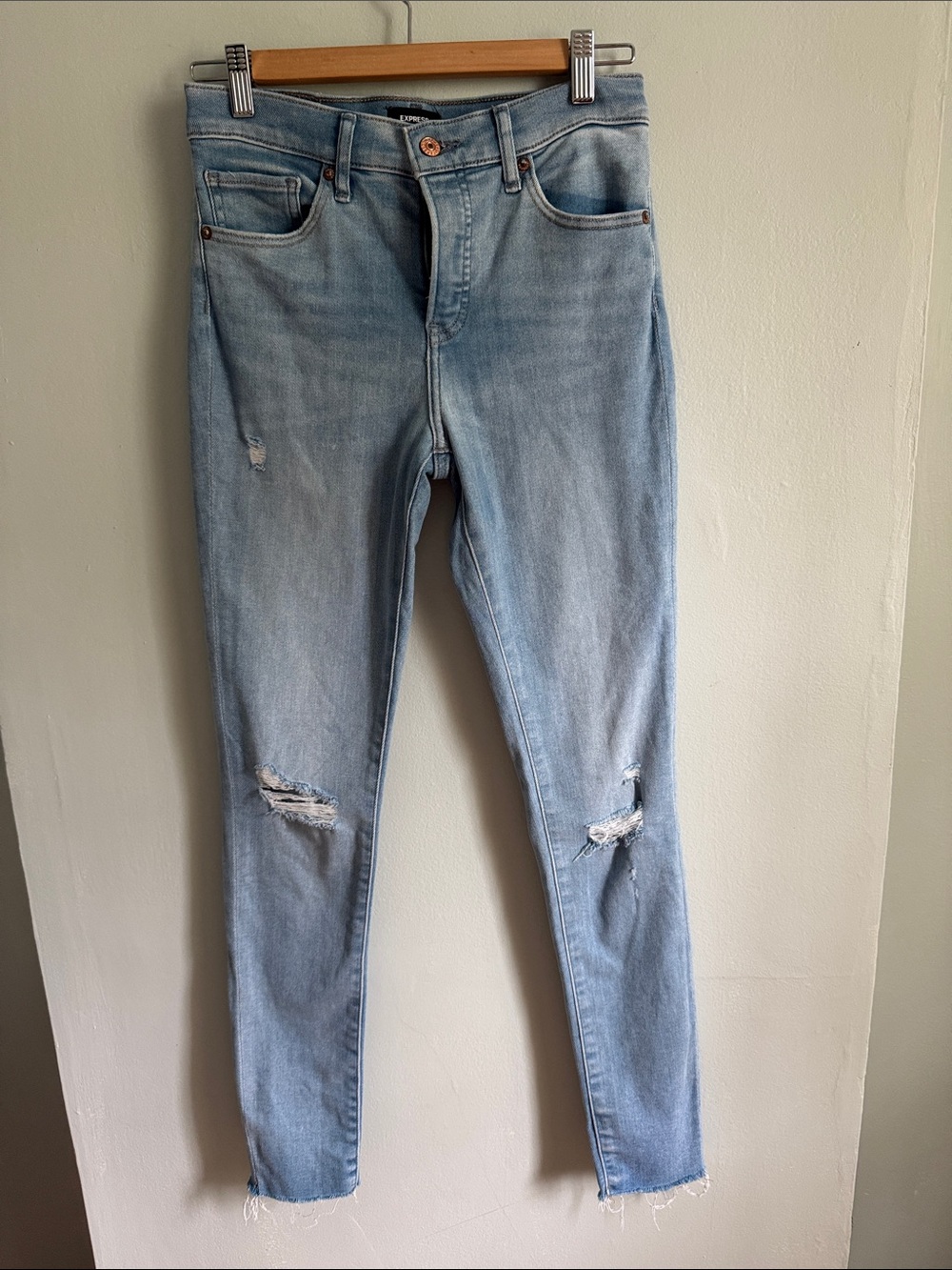 Express Light Blue Skinny Jeans with Knee Rips
